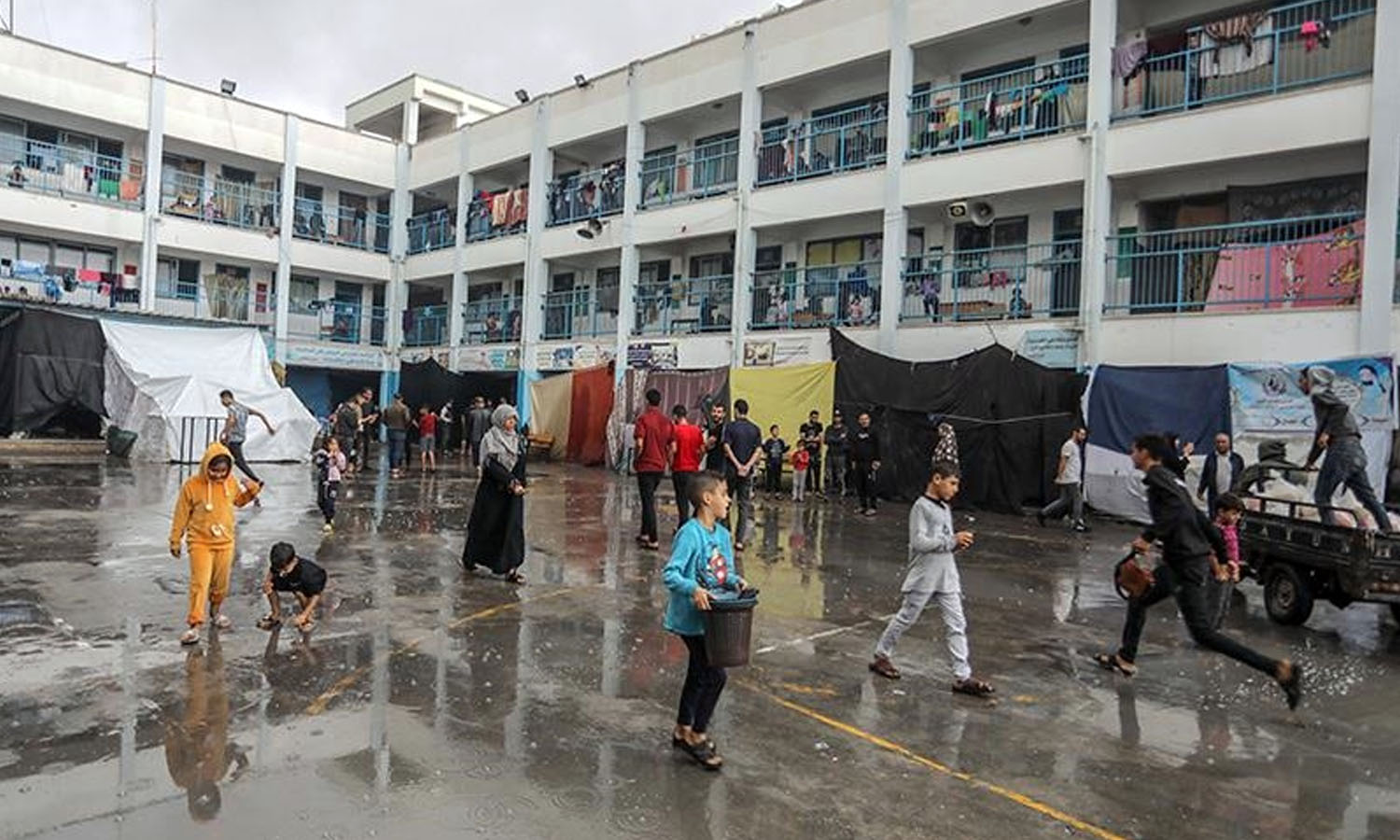 Blessings of Rain in Gaza Amidst Israeli Attacks: Children Find Joy in the Midst of Struggle