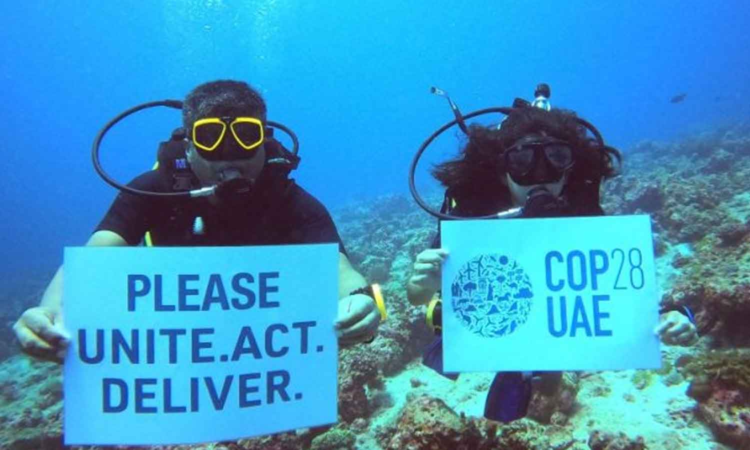 Father And Daughter Dive 70 Feet To Support Climate Summit In Dubai 